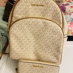 Michael Kors back pack and matching wallet
